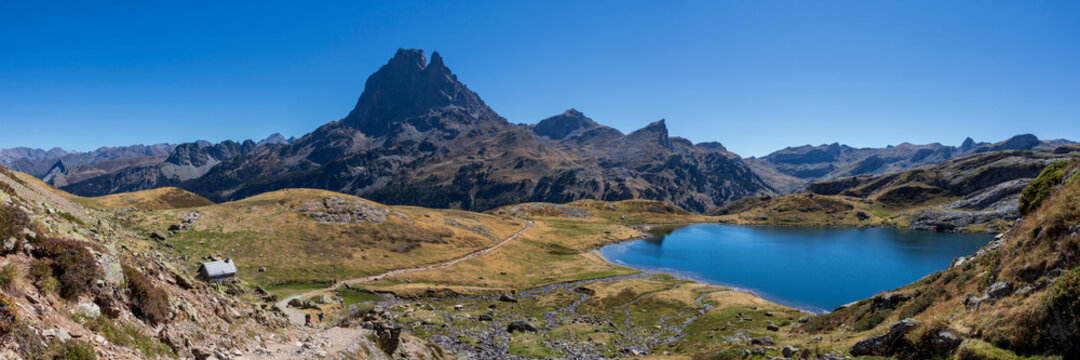 Pic du Midi Ossau mountain and Lac Gentau lake in the french Pyrenees mountains, Pyrenees National Park, France