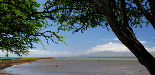 Ancient Kamalo Wharf on Molokai with view of Lanai