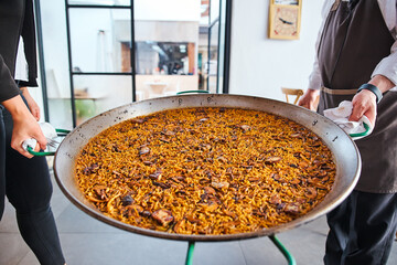 large paella take out the finished meal