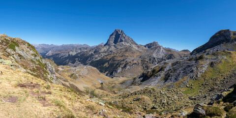 Fototapeta na wymiar Panorama of Ossau Valley with Pic du Midi d'Ossau mountain, Pyrenees National Park, France
