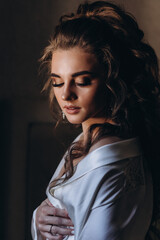 Portrait of the bride. Wedding preparations.