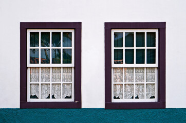 Ancient colonial windows in historical city of Ouro Preto, Brazil