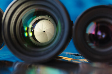 Fototapeta na wymiar Standart camera lens with aperture inside, colorful reflection.