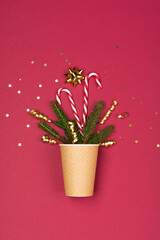 Christmas holiday greeting card template on pink paper background.