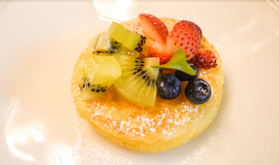 Honey Fruit Pancakes made by kiwifruit strawberry and blueberry
