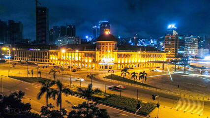 Fototapeta premium Road, lights and sea at night. Luanda city captured from the top