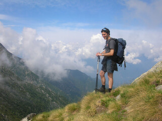 hiker on the top of mountain