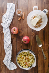 Making a crumble and chestnut apple cake,top view of ingredients needed to make a crumble and apple cake,  baking autumnal cake for halloween , on a old rustic background