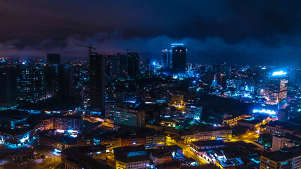 Road, lights and sea at night.
Luanda city captured from the top