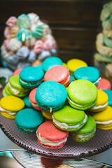 Colorful macaroons. Colorful macarons cakes. Small French cakes. Sweet and colorful french macaroons.