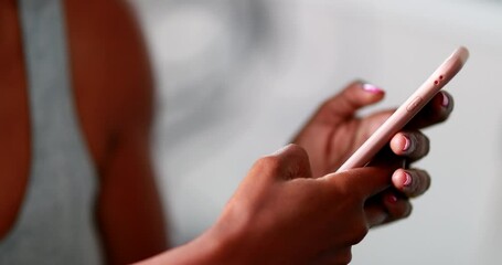 Close-up black person hands holding smartphone device