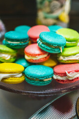 Colorful macaroons. Colorful macarons cakes. Small French cakes. Sweet and colorful french macaroons.