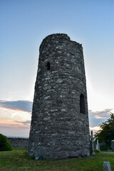 Fototapeta na wymiar Ancient Irish Round Tower at Sunrise