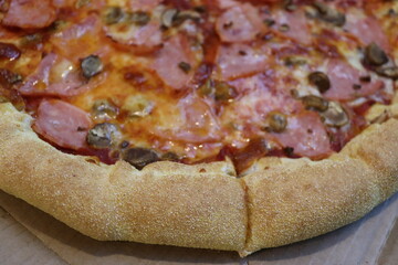 huge pizza with vegetables and mushrooms view