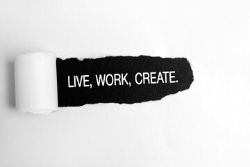 Live, work, create text on torn white paper