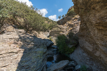 Waterfall in a ravine in Sierra Nevada