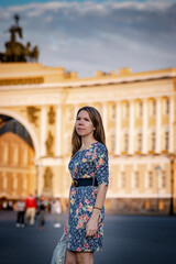 Lady with blue bag on the square