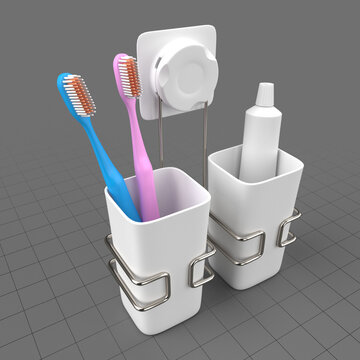 Toothbrushes and toothpaste in holders