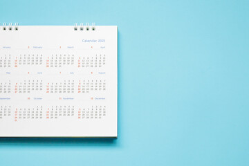 2021 calendar page on blue background business planning appointment meeting concept