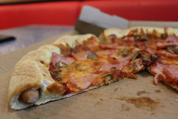 unique hot dog pipe in tasty pizza