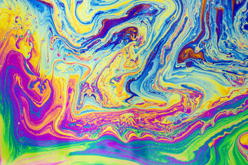 Psychedelic multicolored patterns background. Photo macro shot of soap bubbles