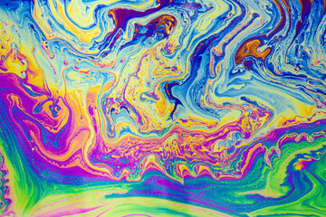 Psychedelic multicolored patterns background. Photo macro shot of soap bubbles