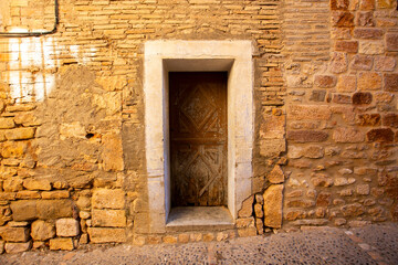 Old wood door from a medieval town in Spain.