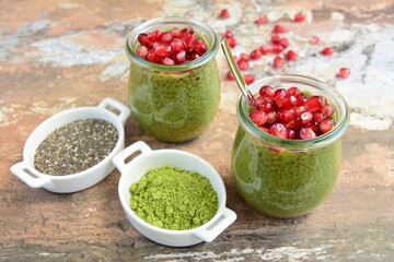 Matcha green tea chia seed pudding with pomegranate seeds