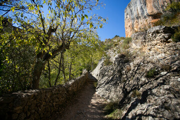 Ruta de las pasarelas, Alquézar. Beautiful route across the river crossing metal walkways and nature trails through the mountain.