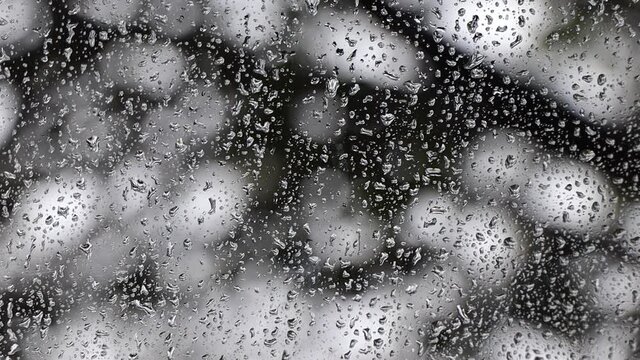 close up shot of rain on a pane of glass