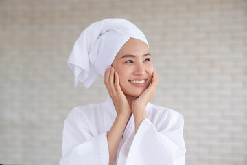 Lady wear bathrobe smile in spa