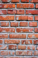 Brick wall. Texture of an old brick wall made of red bricks.