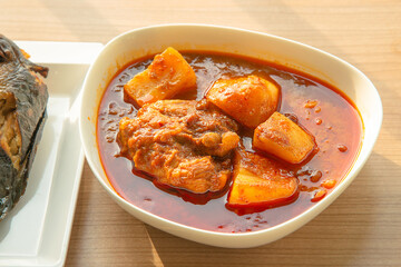 Thai Chicken massaman curry - Thai chicken and potato curry in coconut milk and herb eat with white rice