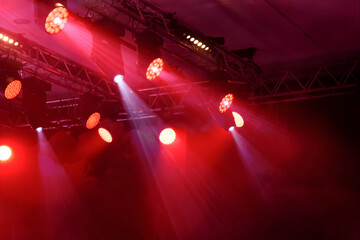 Professional entertainment lights in a music concert or disco night club as a background