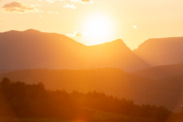 Mountain silhouettes at the sunset.