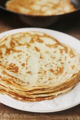 Delicious crepe on a wooden table macro 