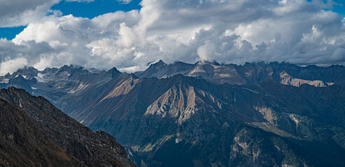Fluffy clouds and high mountains