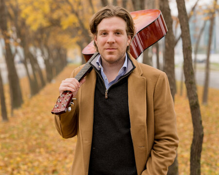 Street musician portrait, fall scene