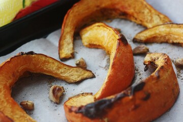 Baked pumpkin with garlic and spices macro 