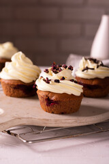 Chocolate muffins with cheese cream