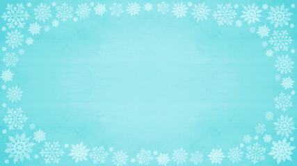 Christmas snow winter background - Frame made of ice crystals on aquamarine turquoise wooden wood texture, top view with space for text
