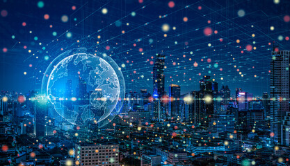 Modern city with wireless network connection and city scape concept.Wireless network and Connection technology concept with city background at night..
