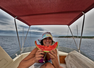Happy woman with a watermelon.
