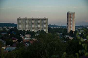 Fototapeta na wymiar Urban landscape of a city. Upper view