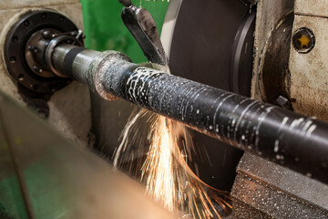 Professional works, the milling process for metal parts, metal machinery in large industrial plants-image