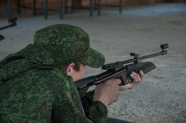 Military camp. Training of snipers in a shooting gallery