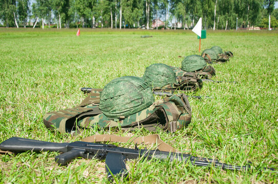 Military camp. Formation of soldiers. Helmets in a row
