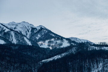 Night view on Mountain resort, Laura, GAZPROM Sochi. Gondola type 3S - the world's longest cable car trunk with ring movement. Mining and tourism center Gazprom ski resort. Sky road sunny day.