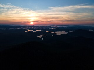 Fototapeta premium Sunrise over a lake in the mountains