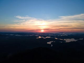 Fototapeta premium Sunrise over a lake in the mountains